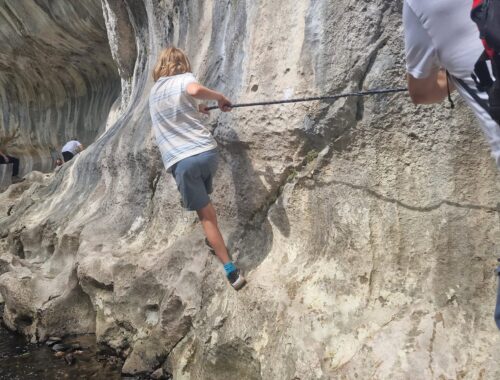child climbing Cheile Băniței or Bănița Gorge which is one of the hidden gems of Romania - taken by Alexandra in England