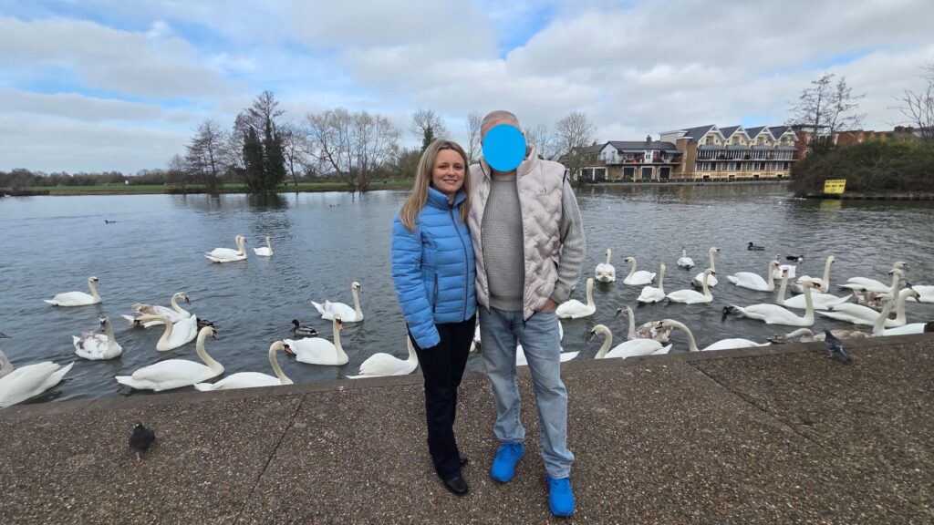 A Day Trip to Windsor and a Royal Surprise 7 swans on river thames seen on a day trip to windsor